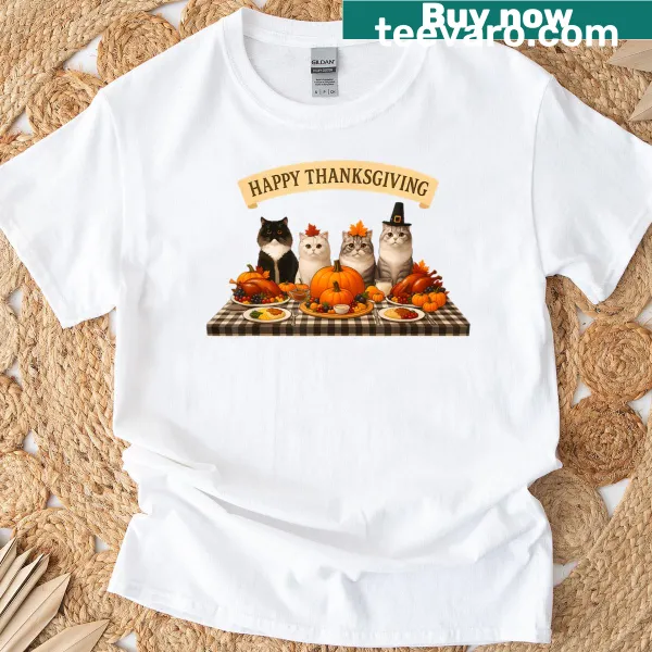 Thanksgiving T-shirt featuring cats at a dinner feast with autumn leaves.