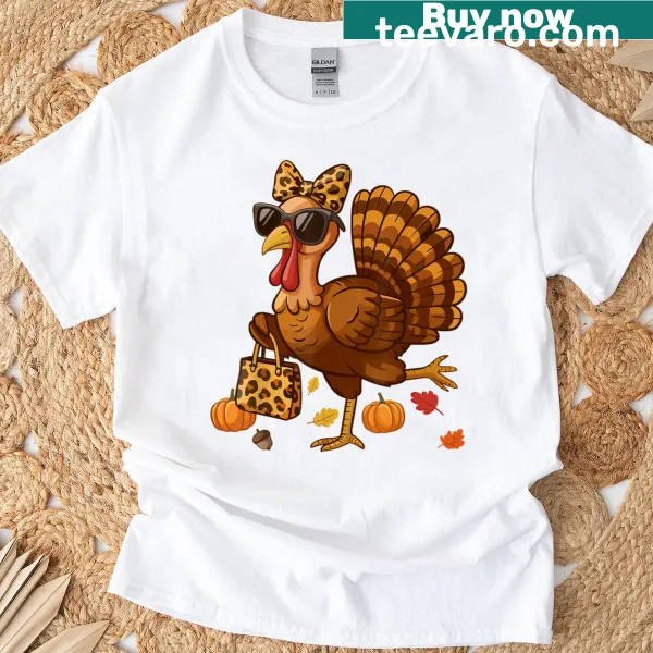 Funny Thanksgiving t-shirt featuring a leopard-print turkey with sunglasses