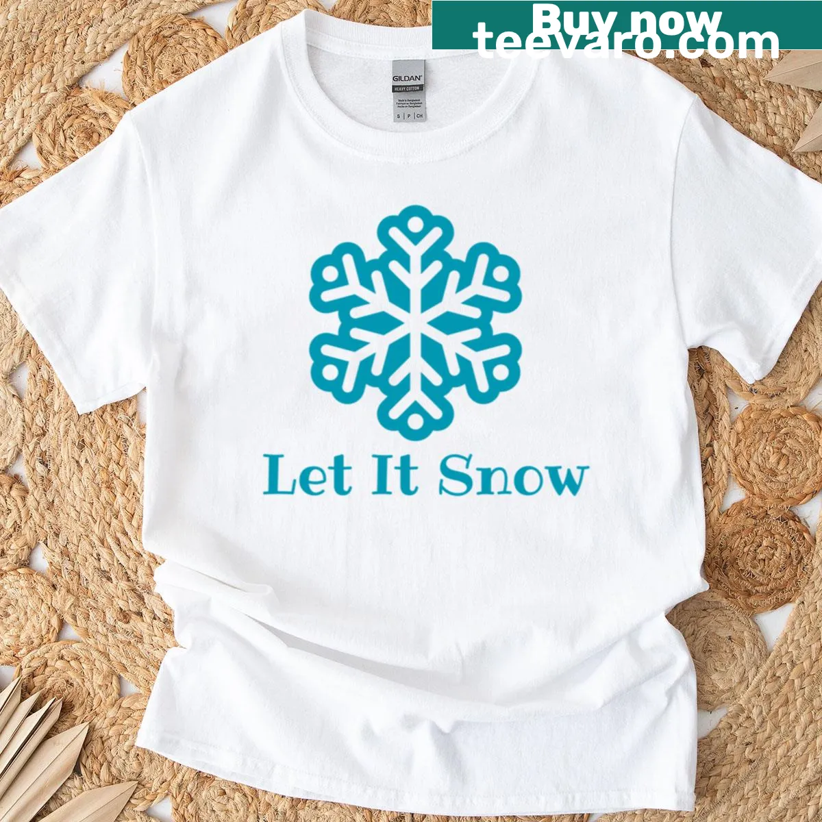Whimsical t-shirt with a snowflake design and Let It Snow phrase — on a men's t-shirt