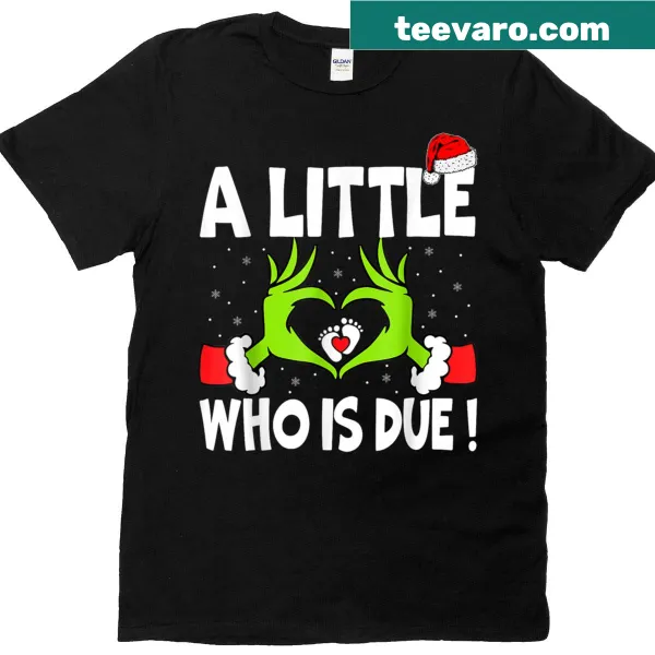 Pregnancy announcement t-shirt designed for Christmas with playful graphics.
