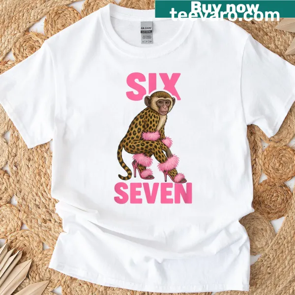 Artistic T-shirt featuring a funky monkey in pink heels.
