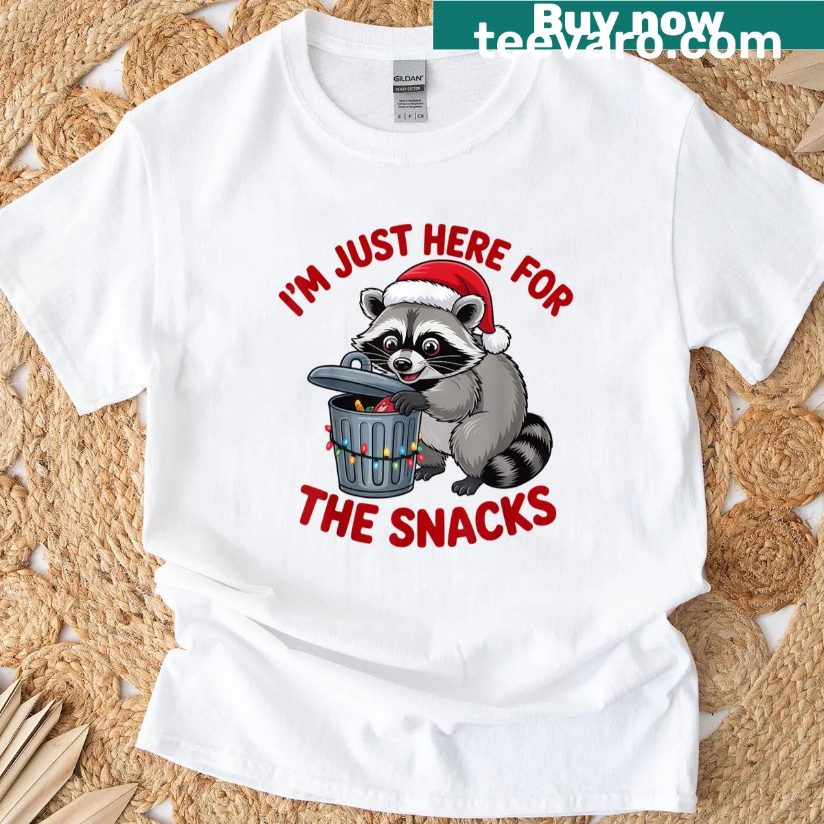 Whimsical Christmas raccoon t-shirt with snack-related text — on a men's t-shirt