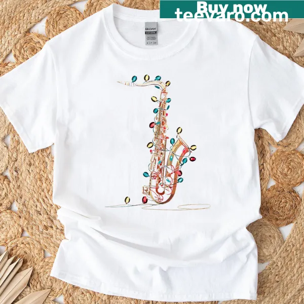 Humorous t-shirt with saxophone and Christmas lights graphics.