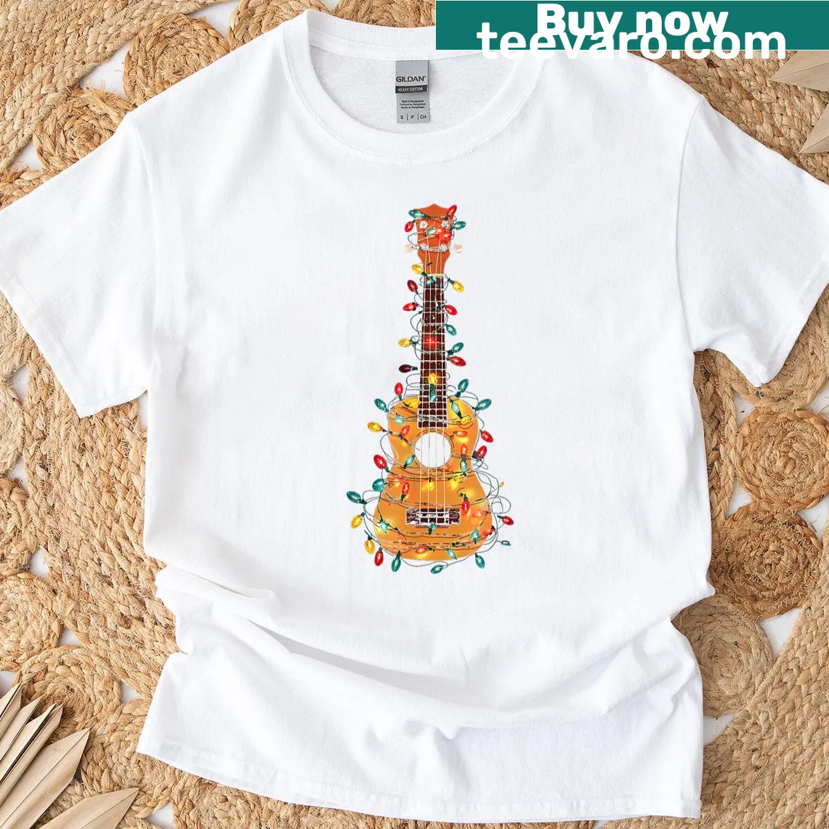 Festive t-shirt with ukulele and Christmas lights illustration. — on a men's t-shirt