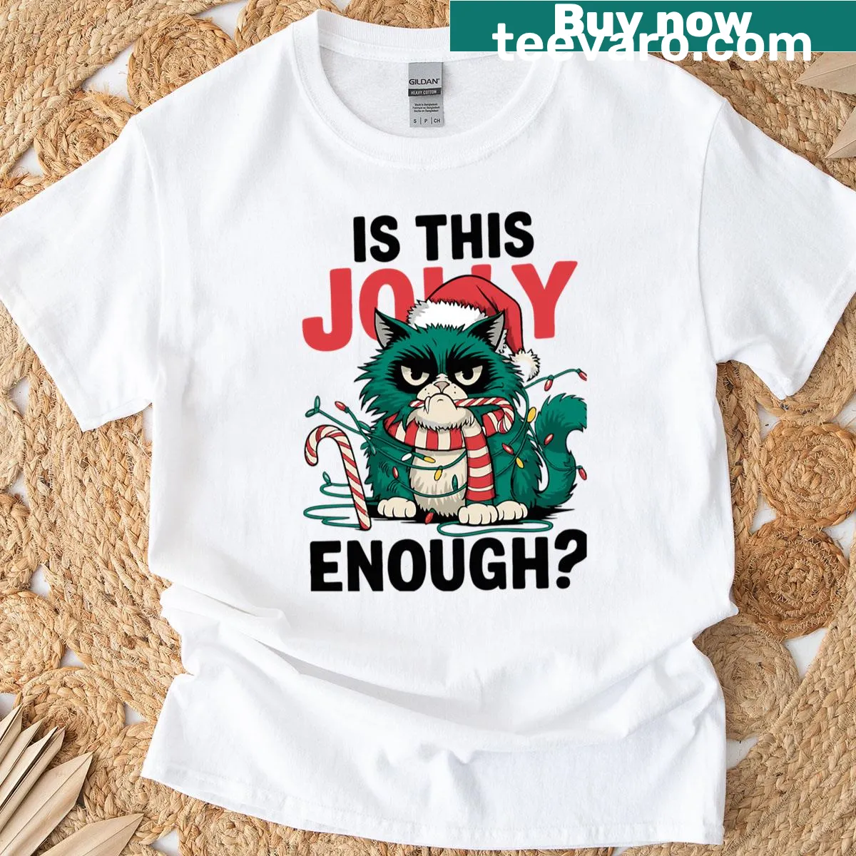 Grumpy cat with candy cane Christmas t-shirt — on a men's t-shirt