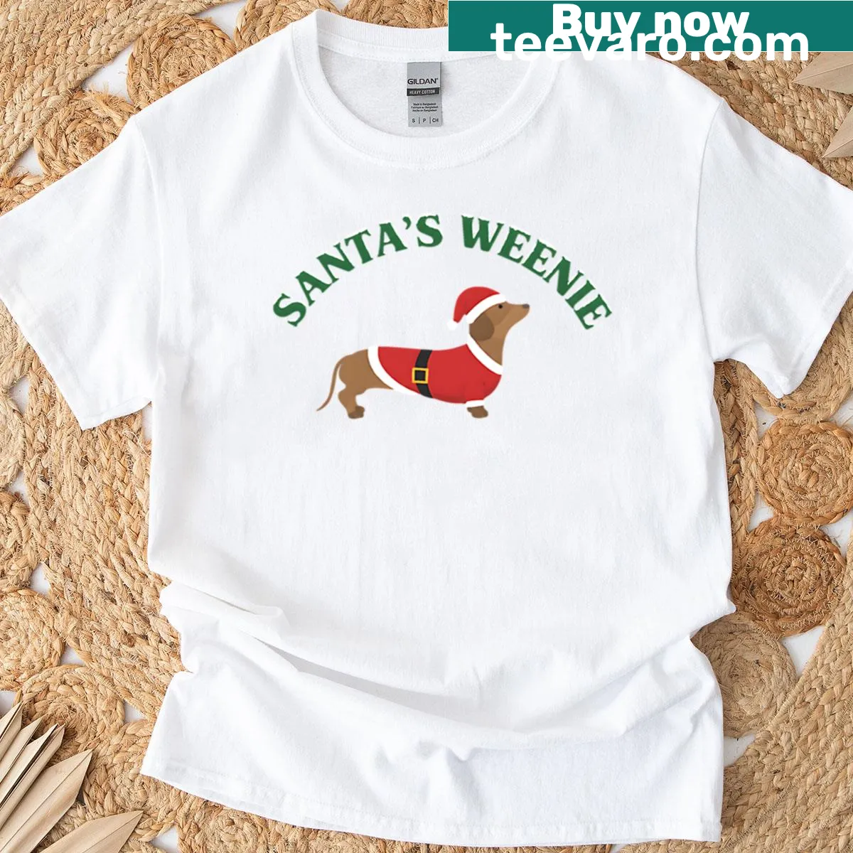 Cute Christmas t-shirt featuring Santa with a dachshund illustration — on a men's t-shirt