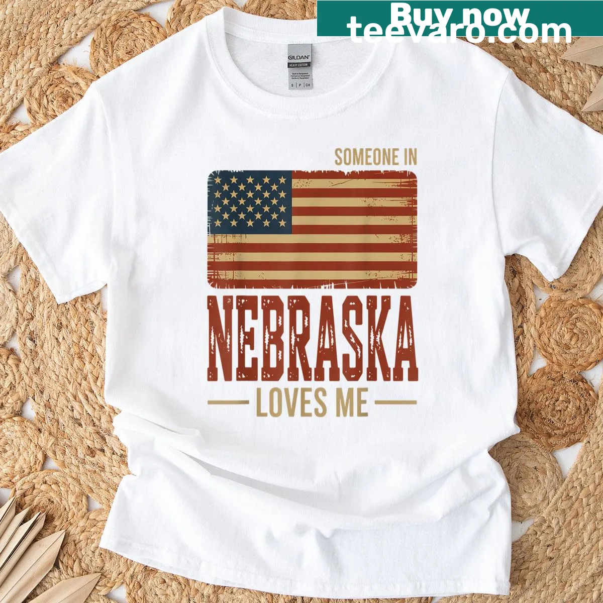 T-shirt with US flag and text saying someone in Nebraska loves me. — on a men's t-shirt