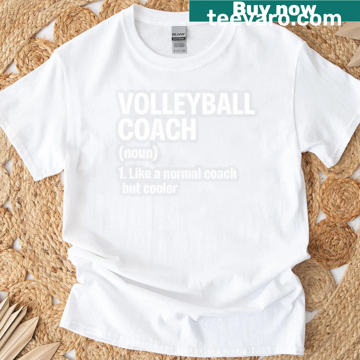 T-shirt featuring a volleyball coach definition in bold text — on a men's t-shirt