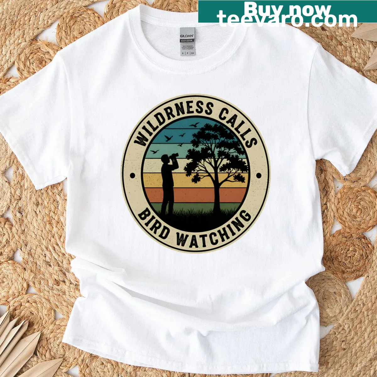 T-shirt with a bird watching design celebrating nature and adventure — on a men's t-shirt