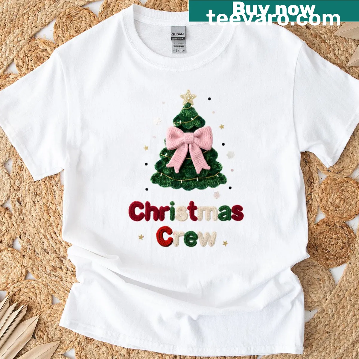 Crochet Christmas tree graphic with pink bow T-shirt — on a men's t-shirt