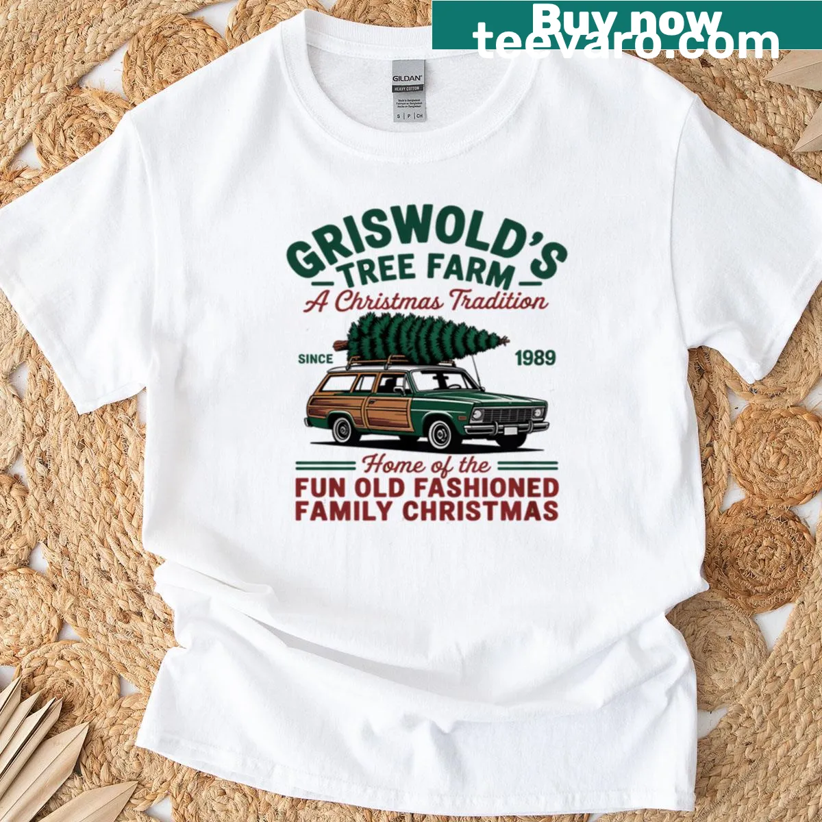 Griswolds Tree Farm themed t-shirt featuring festive illustrations — on a men's t-shirt