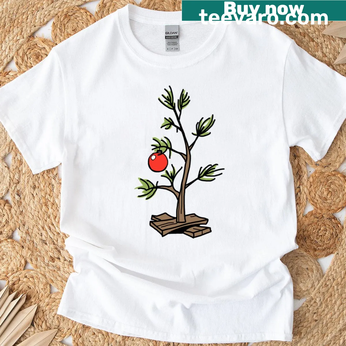 Festive T-shirt featuring Peanuts characters around a Christmas tree — on a men's t-shirt