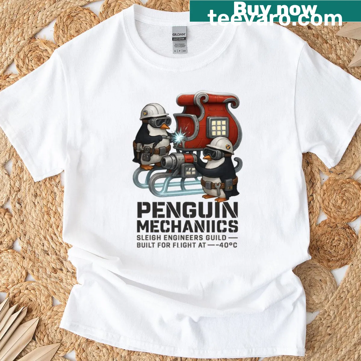 Funny T-shirt with cartoon penguins as sleigh mechanics — on a men's t-shirt