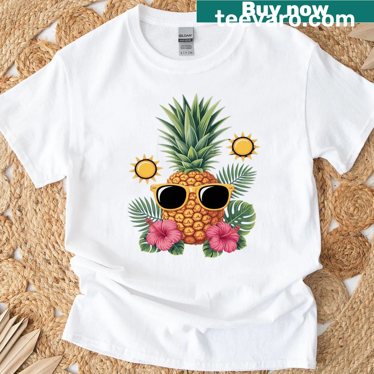 Tropical pineapple and hibiscus flowers graphic T-shirt — on a men's t-shirt