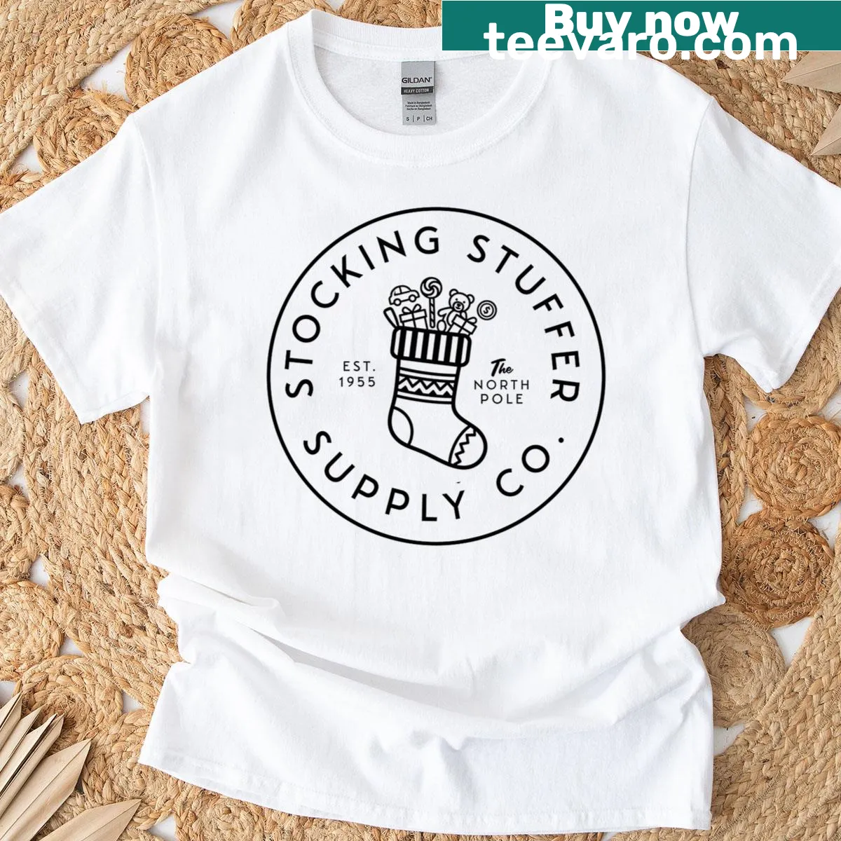 Retro holiday logo Christmas T-shirt from Stocking Stuffer Supply Co — on a men's t-shirt