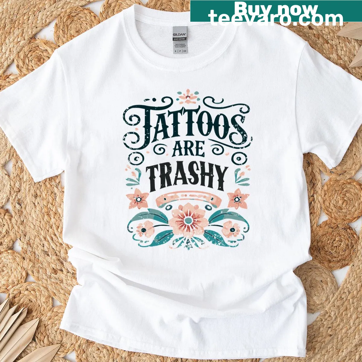 Vintage sarcastic tattoo-themed t-shirt with floral accents — on a men's t-shirt