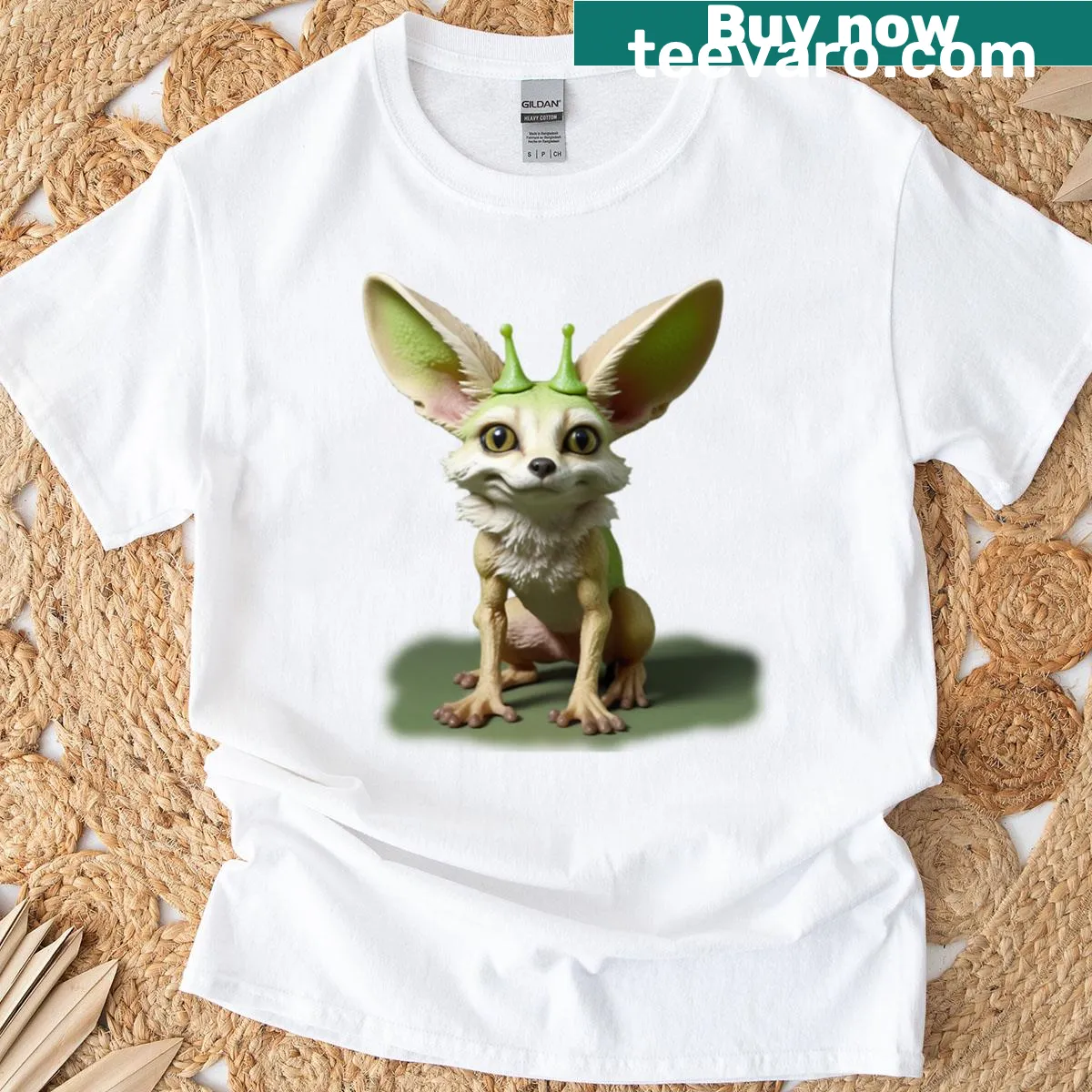 Cartoon creature with large ears and expressive eyes on a green surface — on a men's t-shirt