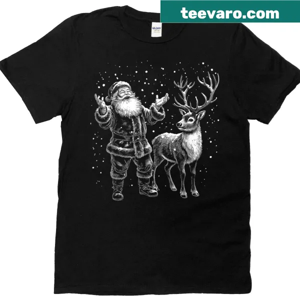 Vintage Christmas T-shirt featuring Santa and reindeer in snow