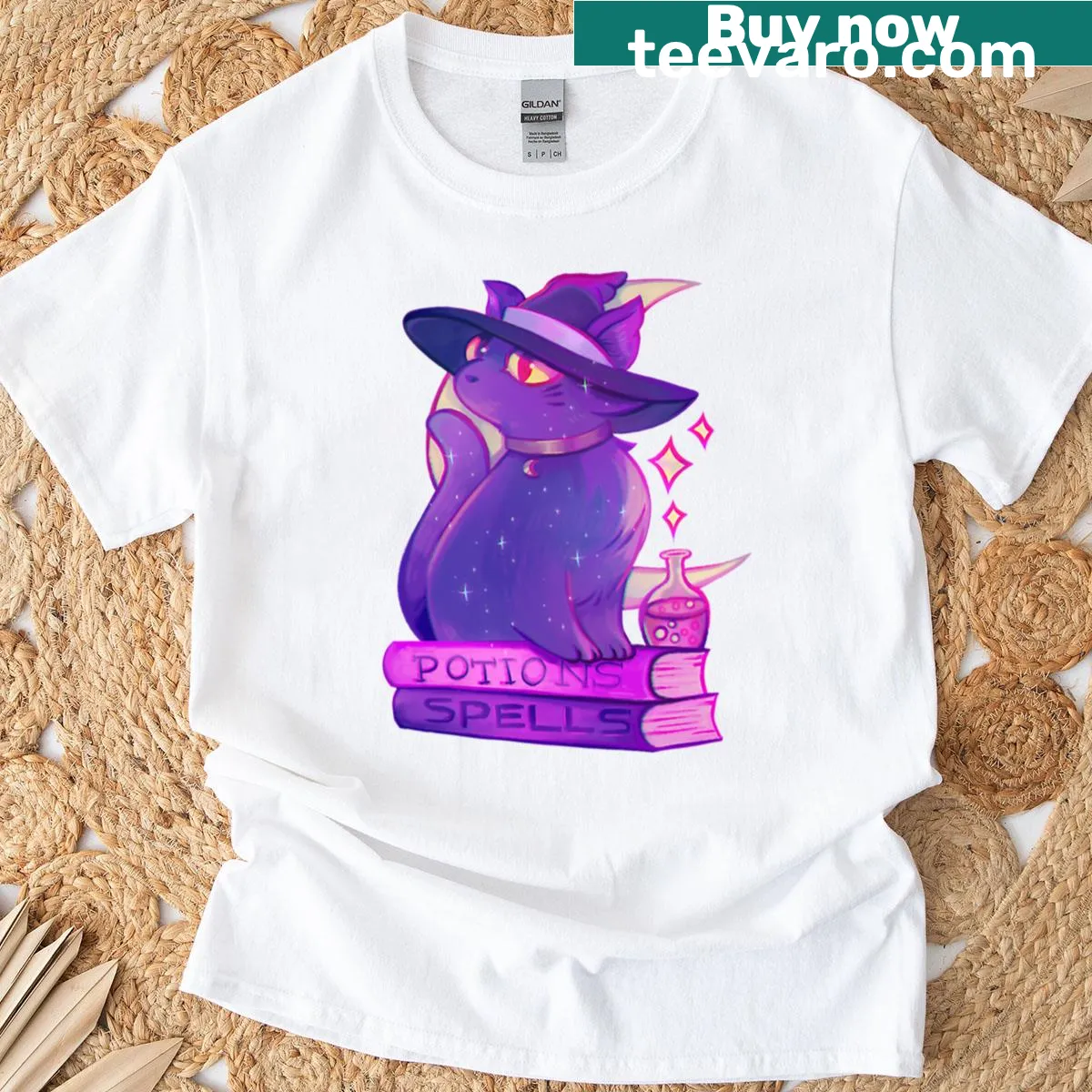 Whimsical witchy cat graphic on t-shirt — on a men's t-shirt