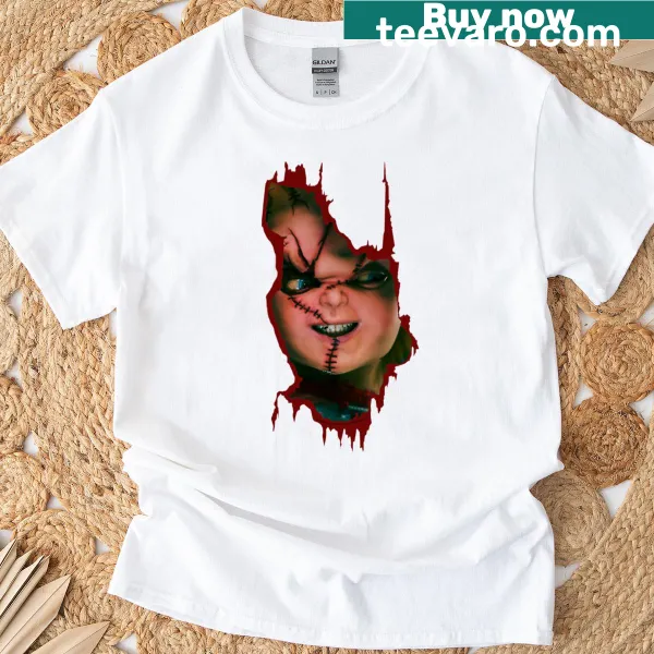 Child's Play t-shirt with cartoon Chucky and text saying 'Here's Chucky'