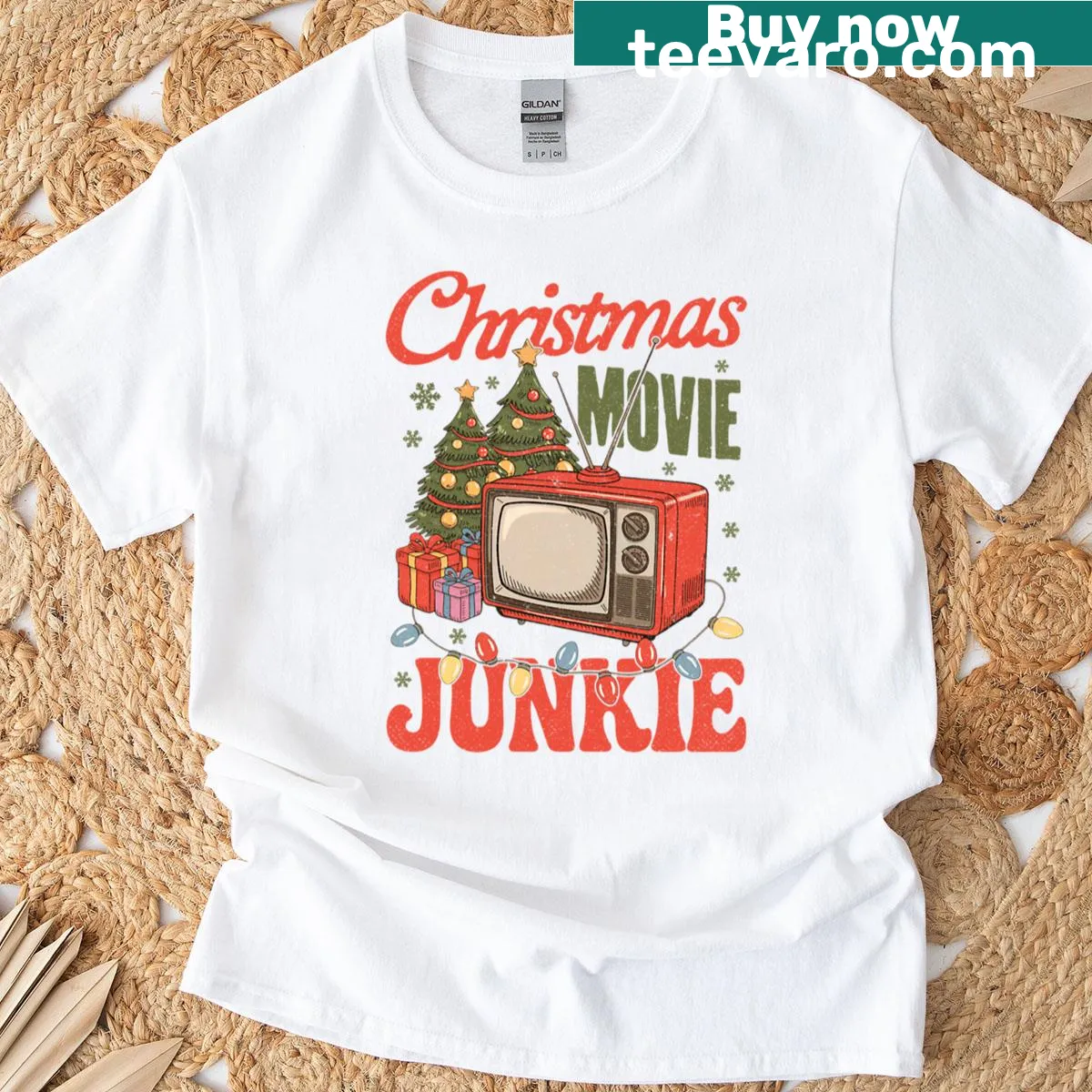 Typographic Christmas movie junkie graphic t-shirt — on a men's t-shirt