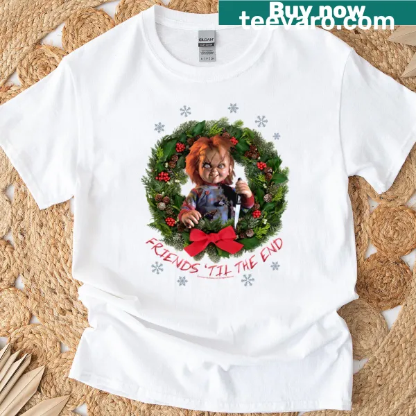 Cartoon Chucky in a Christmas wreath on a festive T-shirt