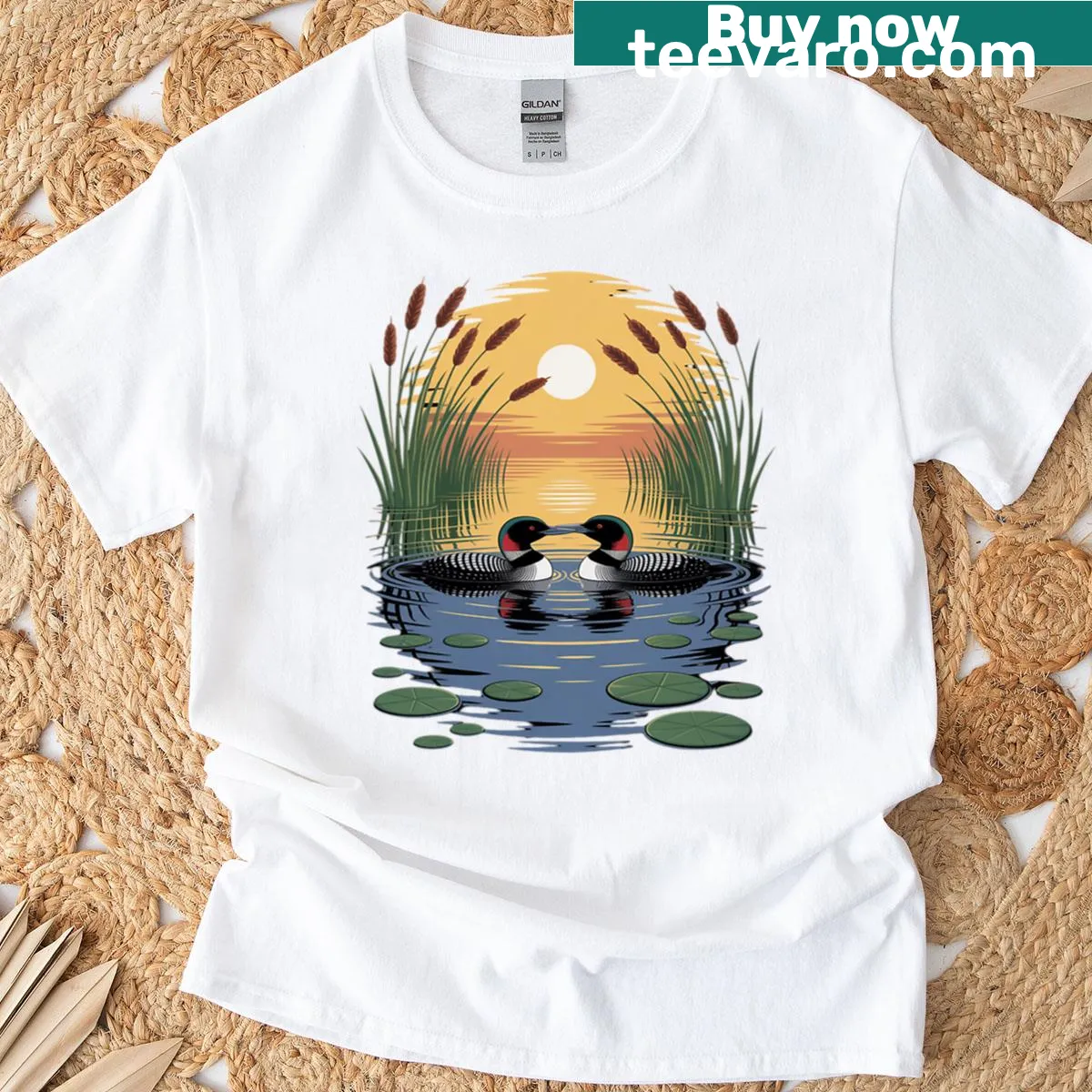 Illustration of common loons on a lake for a nature t-shirt — on a men's t-shirt