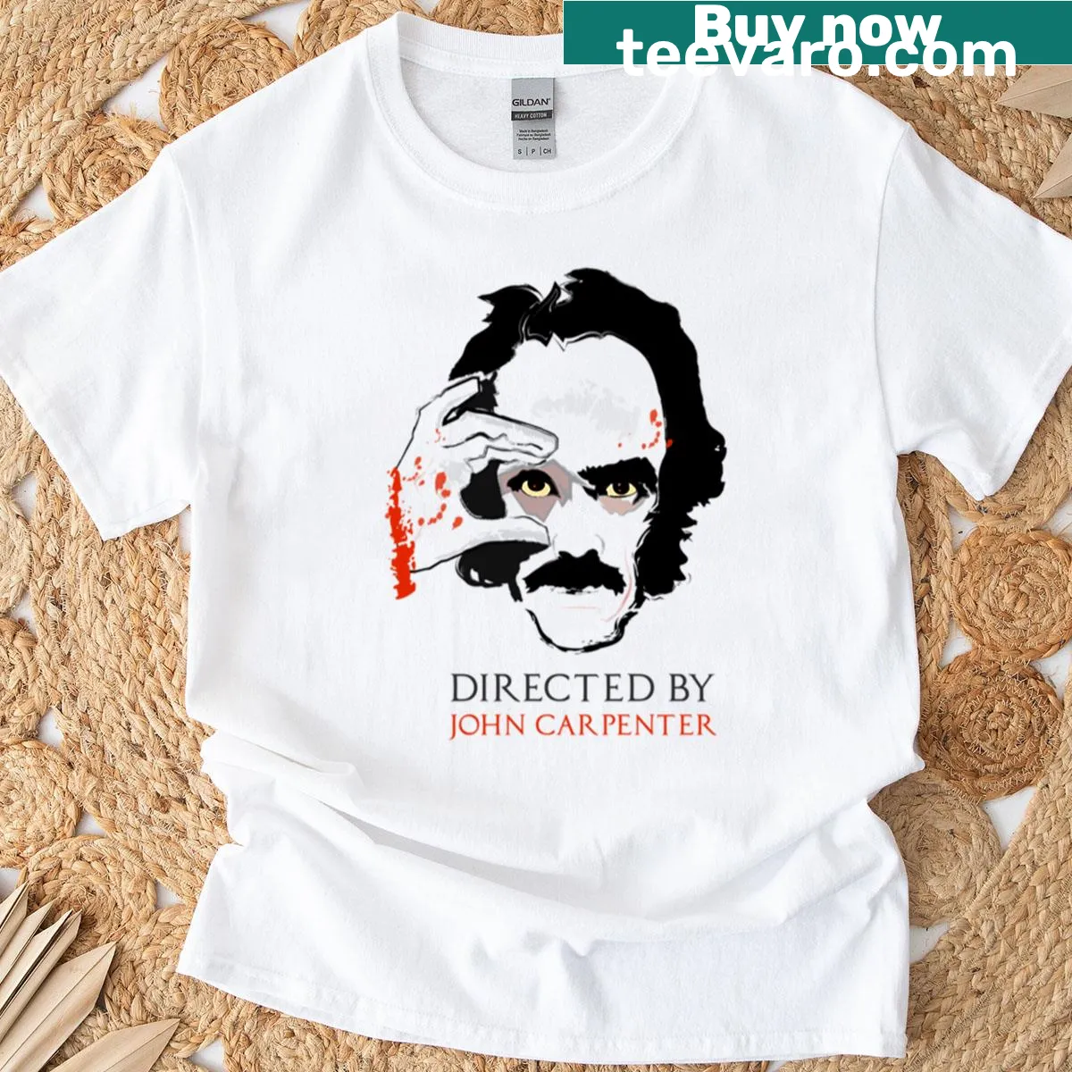 T-shirt featuring Directed By John Carpenter text in vintage font — on a men's t-shirt