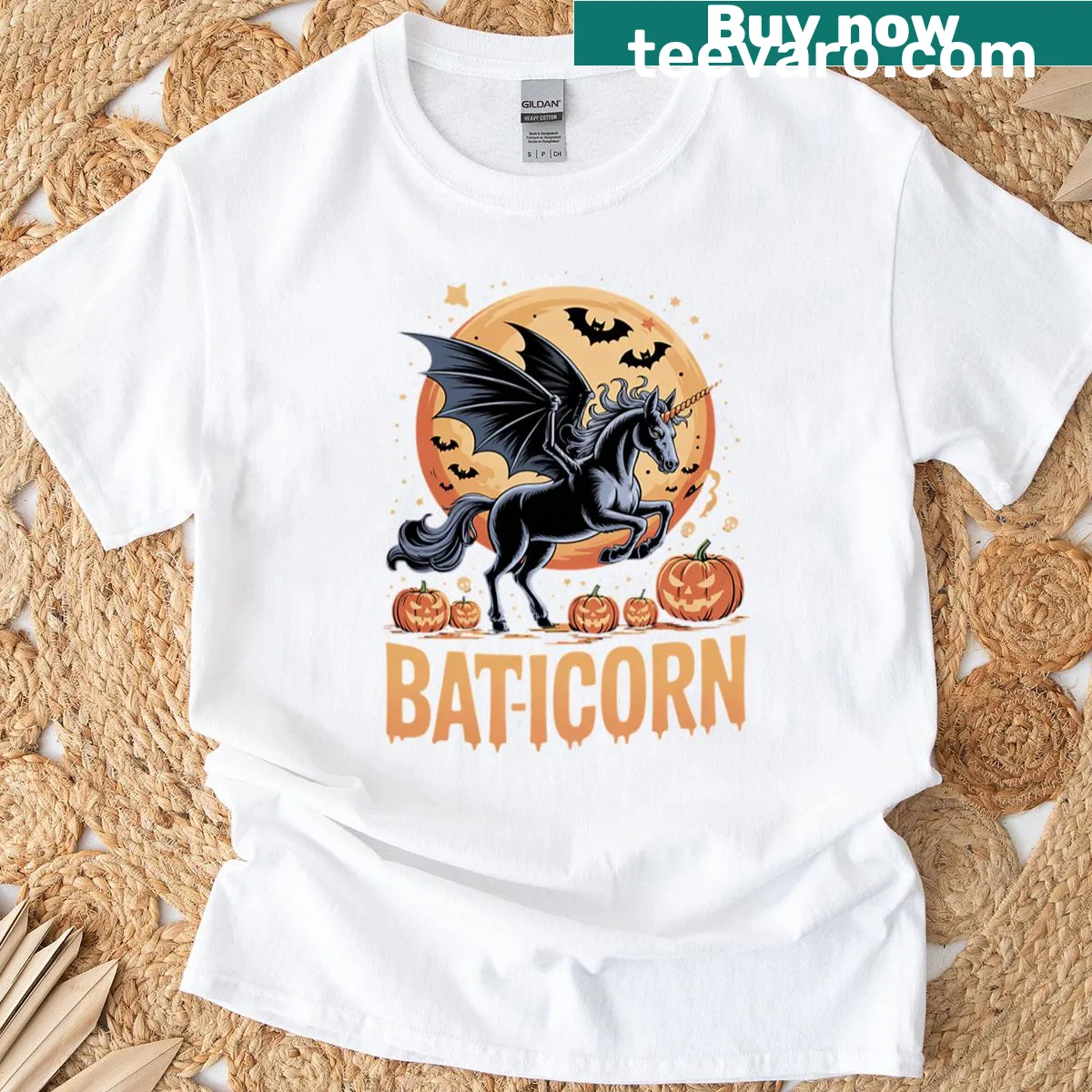 Halloween T-shirt featuring a flying unicorn with bat wings — on a men's t-shirt