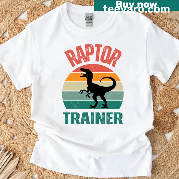 Cartoon T-shirt featuring a cute raptor trainer graphic for kids.