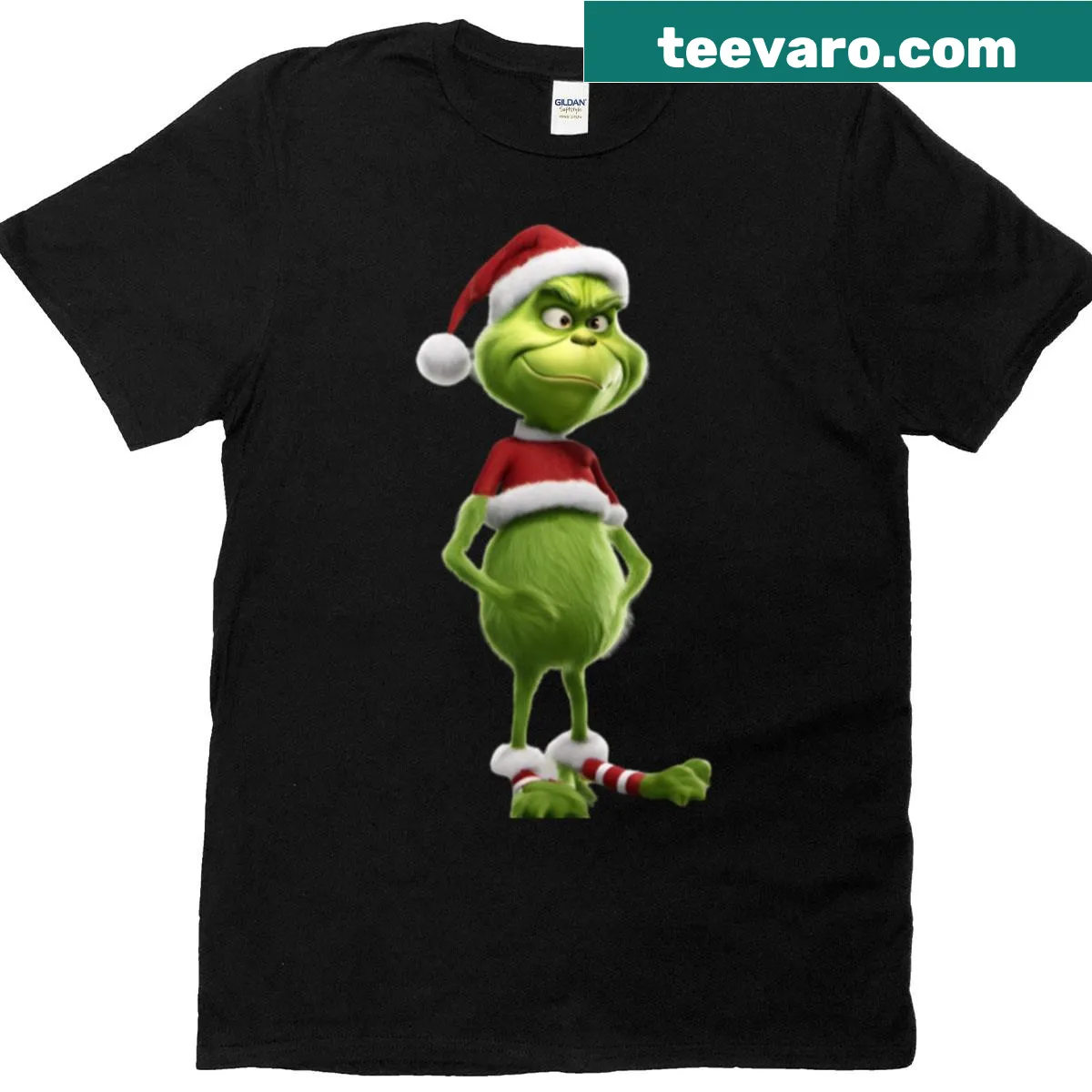 Whimsical Grinch in Santa outfit funny Christmas t-shirt — on a men's t-shirt