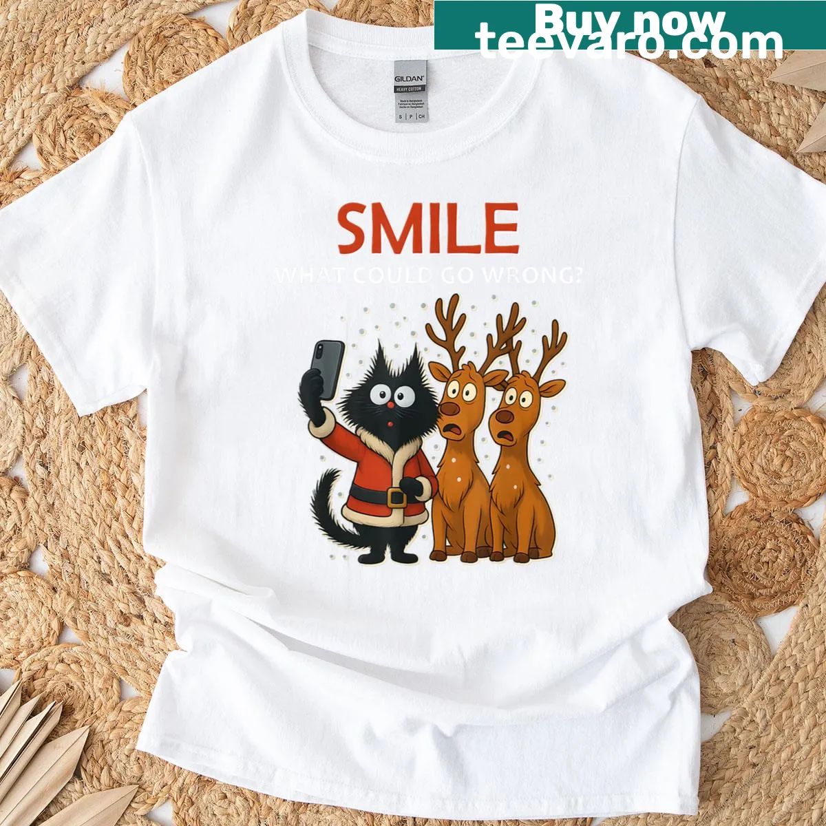Funny Christmas t-shirt featuring playful cats in holiday chaos — on a men's t-shirt