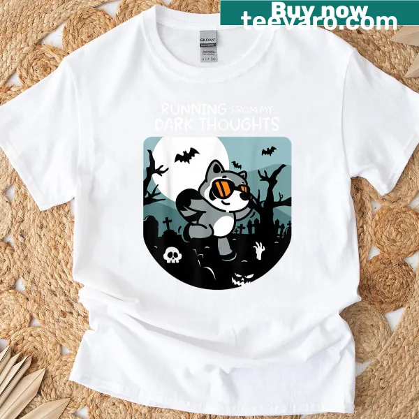 Funny Halloween t-shirt featuring a cartoon raccoon running away