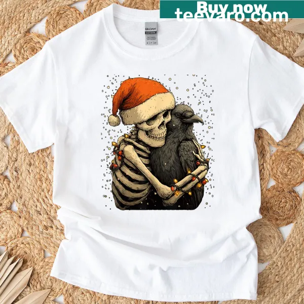 Gothic Christmas t-shirt with a skeleton hugging a crow in a Santa hat