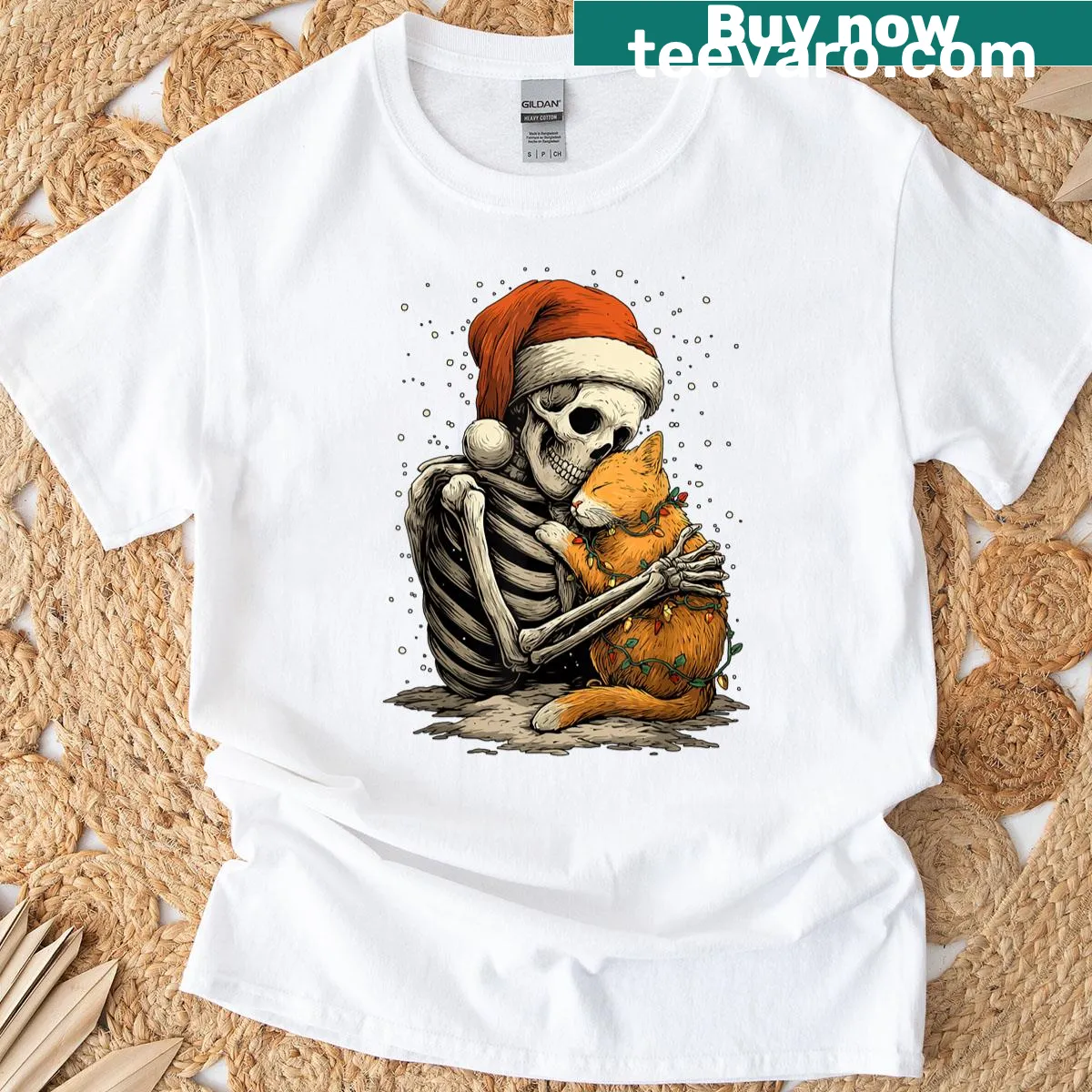 Skeleton Santa hugging tabby cat graphic on winter-themed shirt — on a men's t-shirt