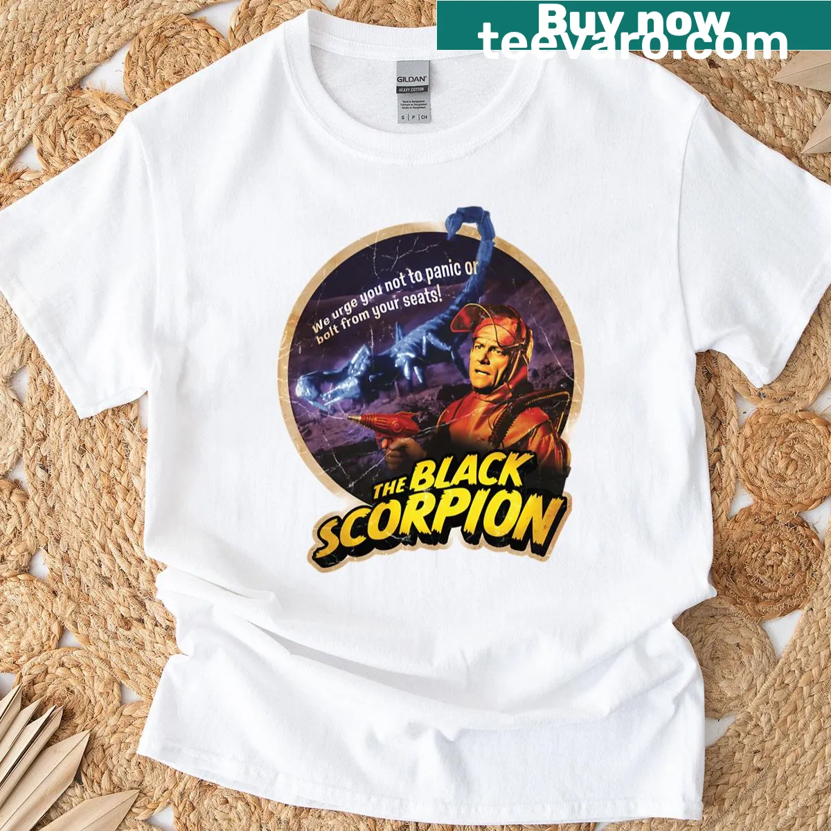 Illustrated T-shirt featuring a bold scorpion graphic — on a men's t-shirt