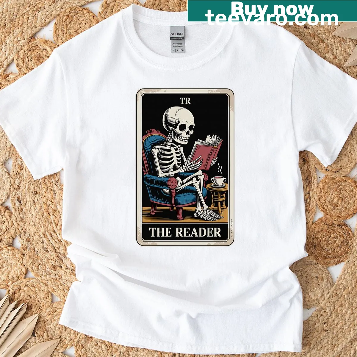 Funny T-shirt showing a skeleton reading tarot cards — on a men's t-shirt