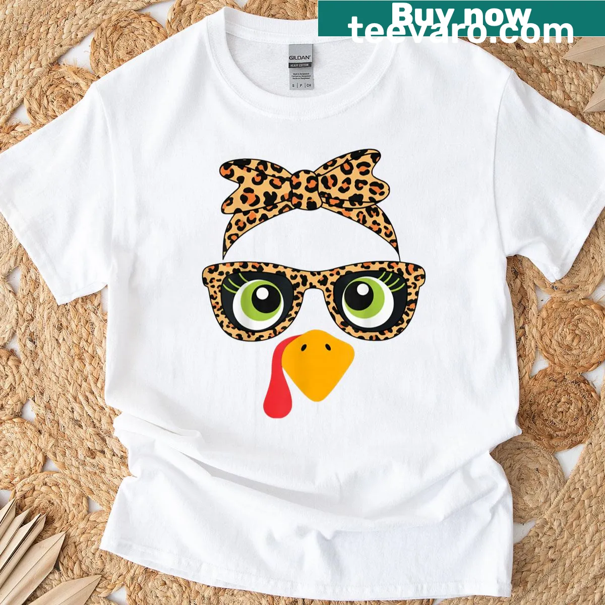 Cute Thanksgiving t-shirt featuring a turkey face with leopard print glasses, perfect for festive wear — on a men's t-shirt