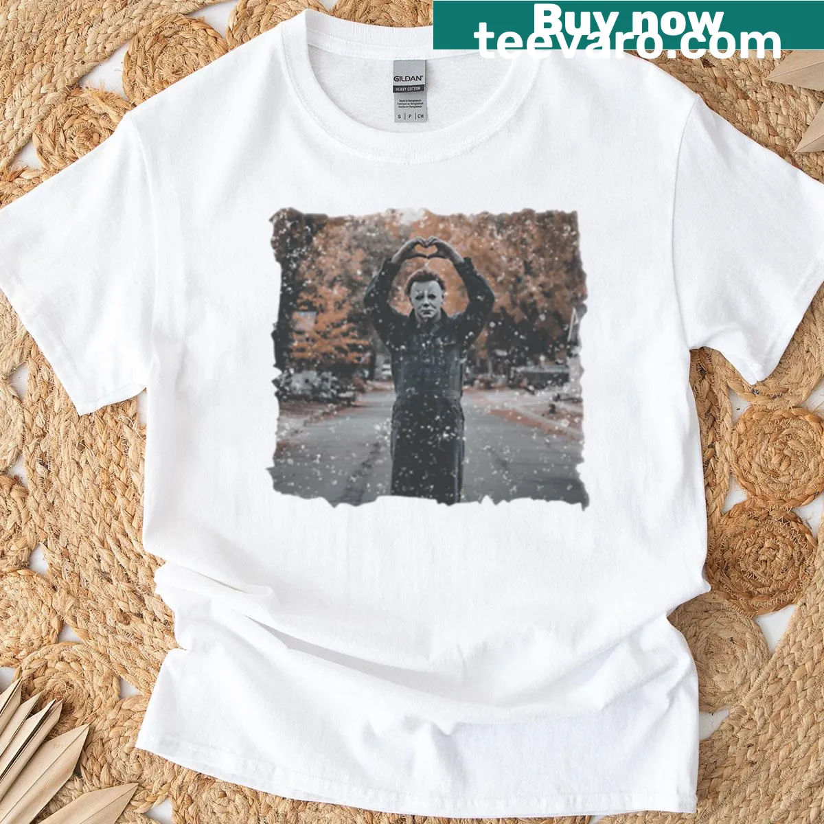 Vintage Michael Myers t-shirt featuring heart hands graphic in retro style — on a men's t-shirt