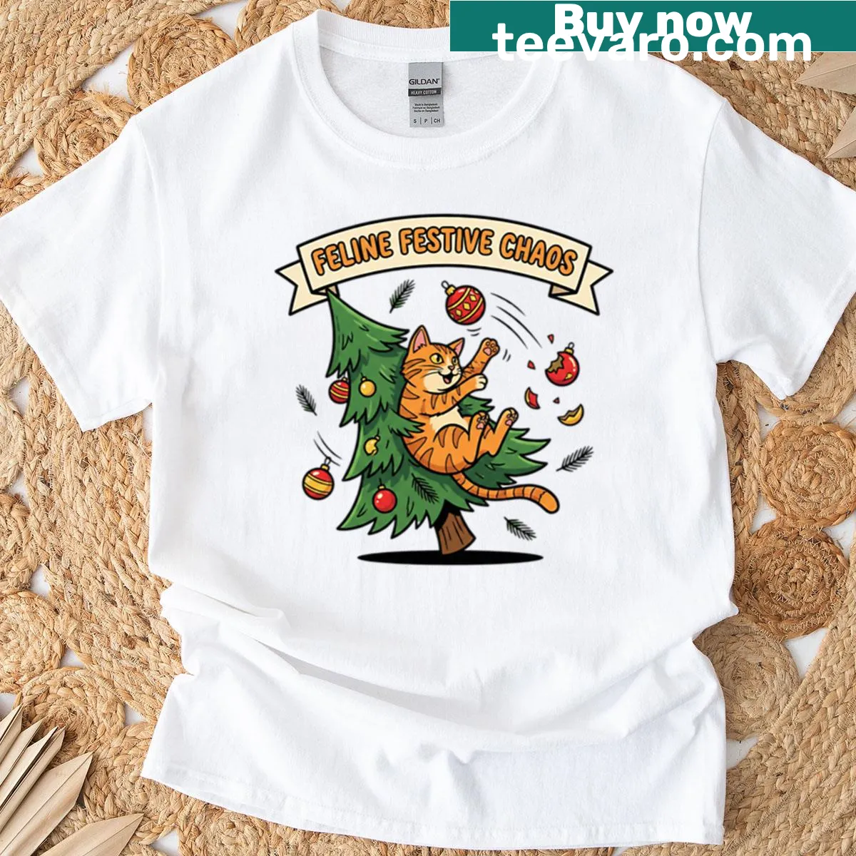 Whimsical cat causing chaos with broken ornaments on a t-shirt — on a men's t-shirt