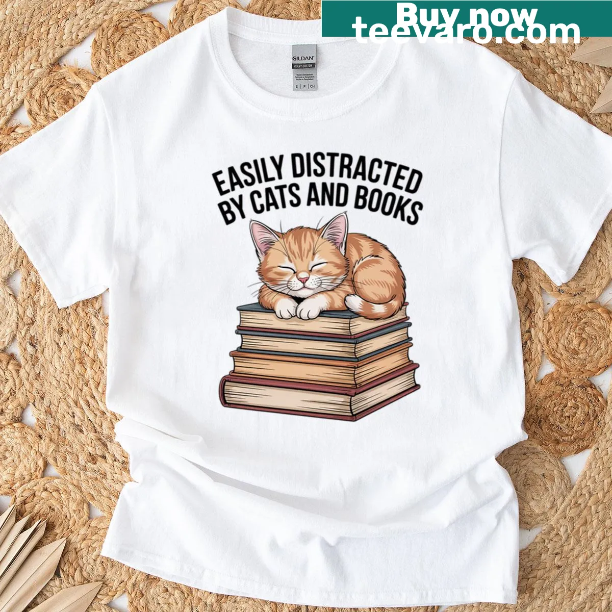 Easily Distracted By Cats And Books T-shirt featuring playful typography — on a men's t-shirt