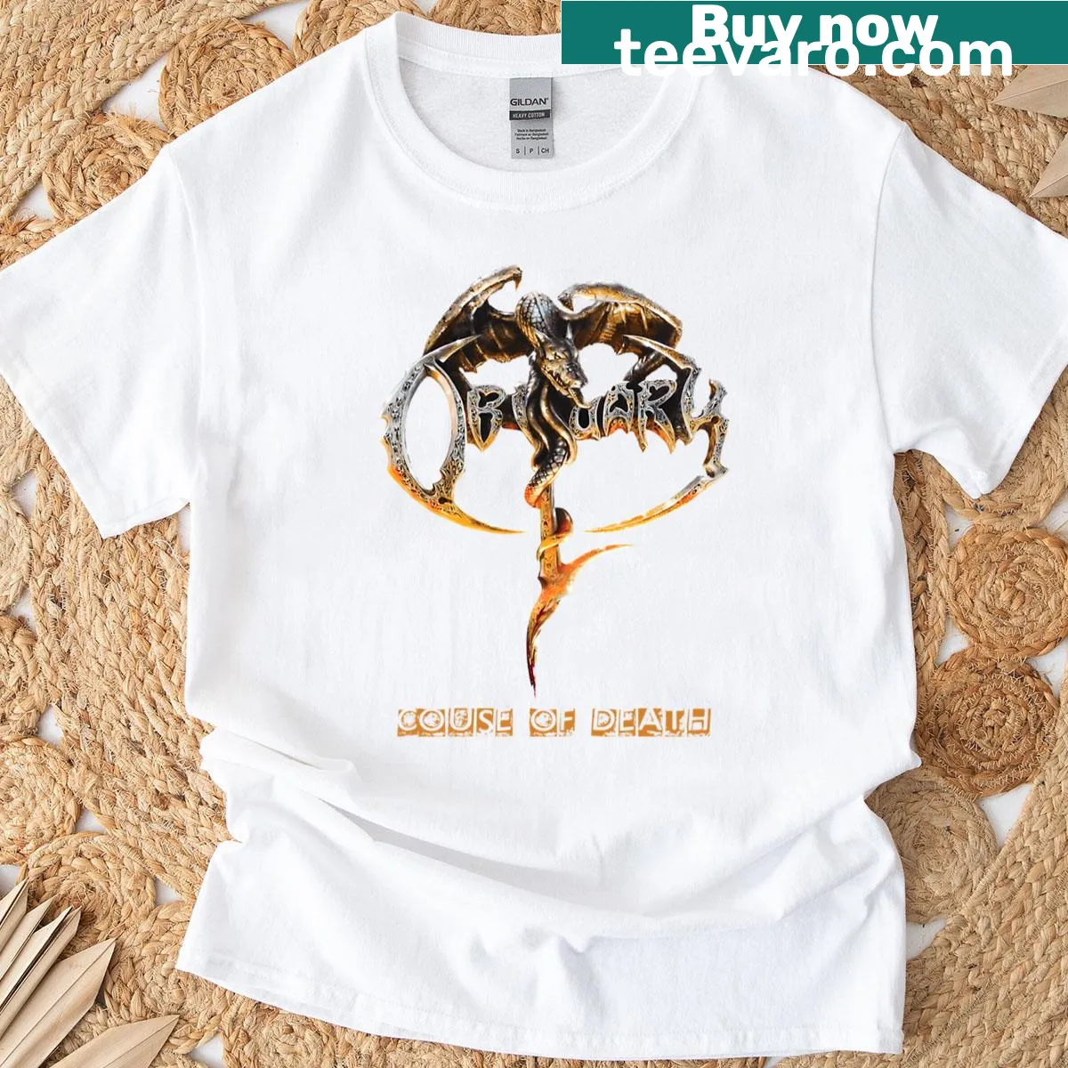 Distressed Obituary band logo graphic T-shirt with vintage style — on a men's t-shirt
