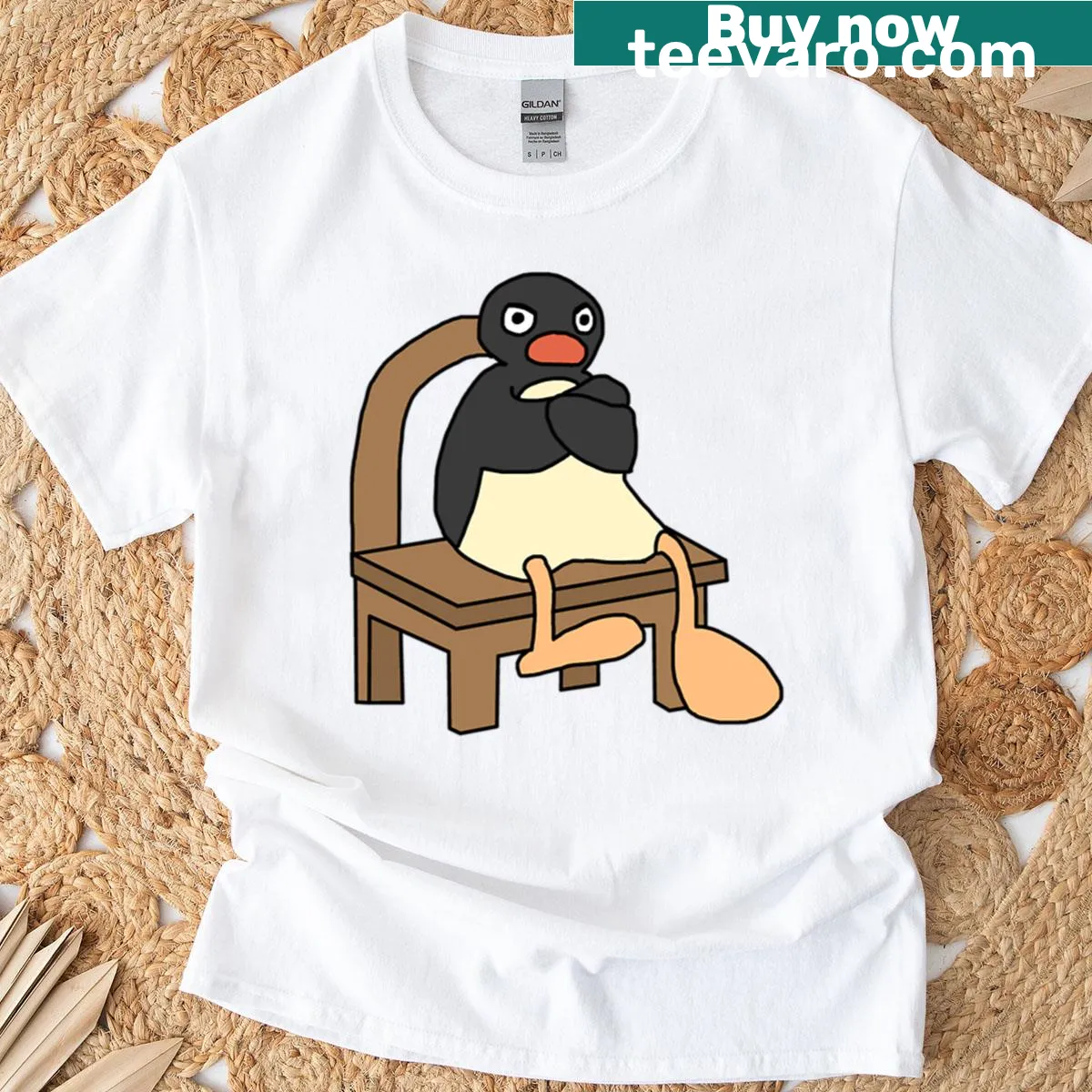 Cartoon graphic of an angry penguin on a t-shirt. — on a men's t-shirt