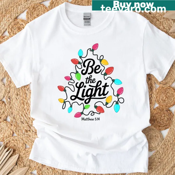 Inspirational Christmas-themed t-shirt with lights and text