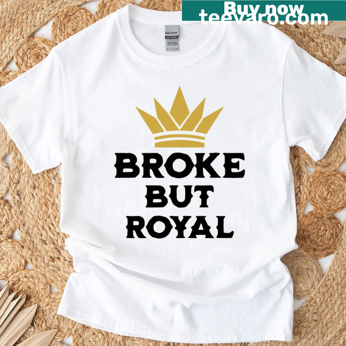 Minimalist T-shirt with crown graphic and 'Broke But Royal' quote — on a men's t-shirt
