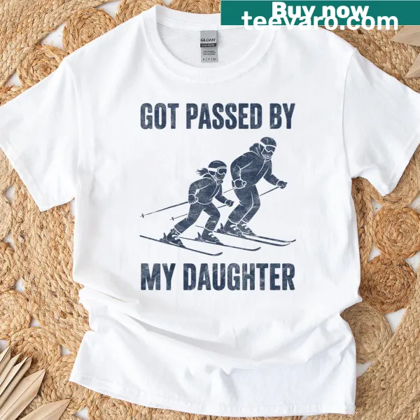 Funny skiing T-shirt with daughter passing father