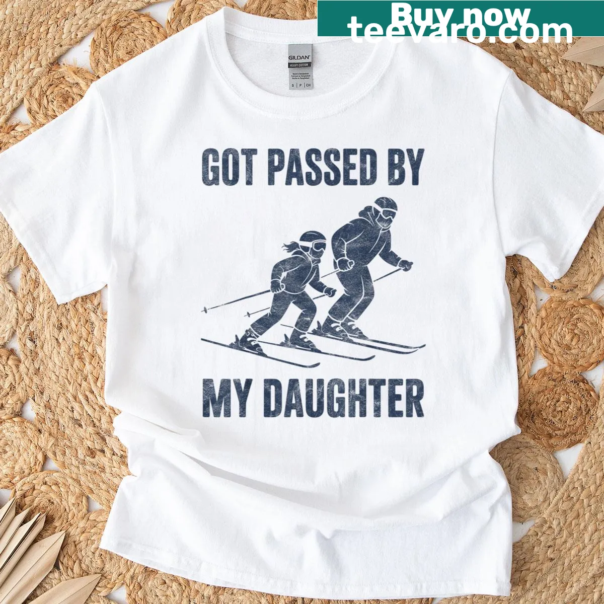 Funny skiing T-shirt with daughter passing father — on a men's t-shirt