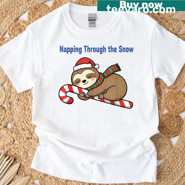 Cute sloth napping in snow with candy canes on T-shirt