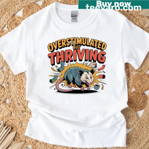 Cartoon opossum graphic t-shirt representing humor and chaos