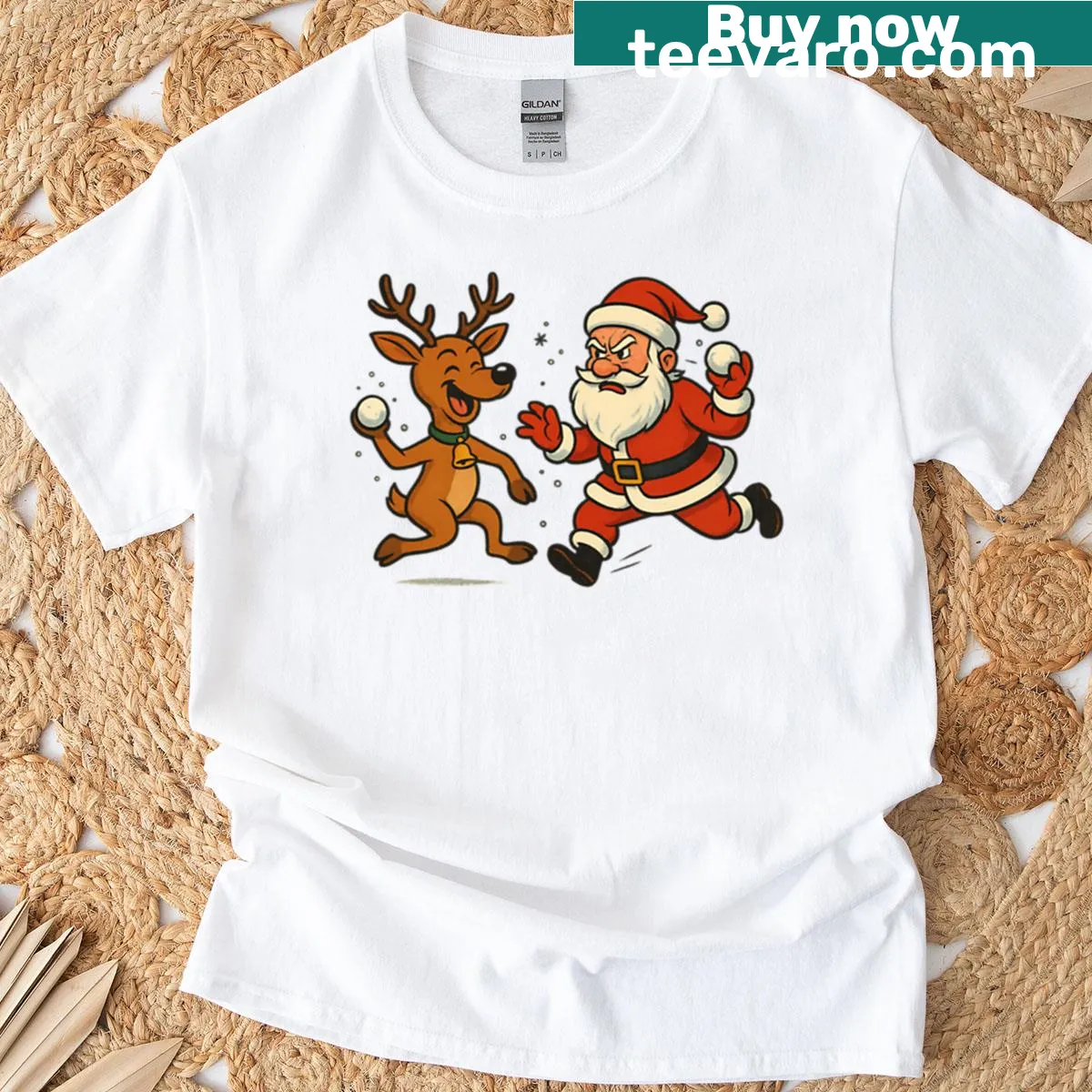 Santa and reindeer in a snowball fight graphic on t-shirt — on a men's t-shirt